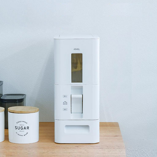 White kitchen storage container with a digital display on a wooden surface.