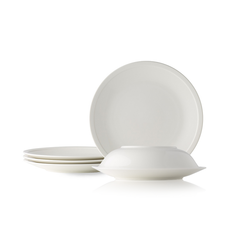 The Adam Liaw Everyday Noritake large plate and bowl set. The image shows a white porcelain bowl stacked upside down on a plate, with other plates stacked and displayed nearby, against a white background.
