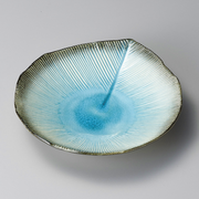 Japanese Aizome dye technique on a leaf-shaped plate.