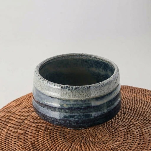 Ao Unofu Japanese Matcha Bowl featuring a soft, milky glaze with gentle blue accents and a rustic, handcrafted texture.