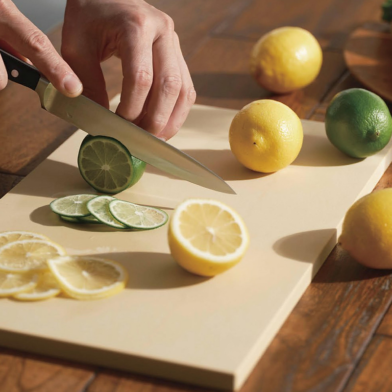 Two Asahi antibacterial rubber cutting boards of different sizes, shown in their branded Japanese paper sleeves.