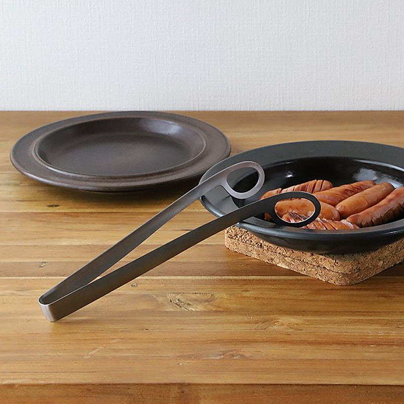 Aux Leye tongs with distinctive hole design on both sides.