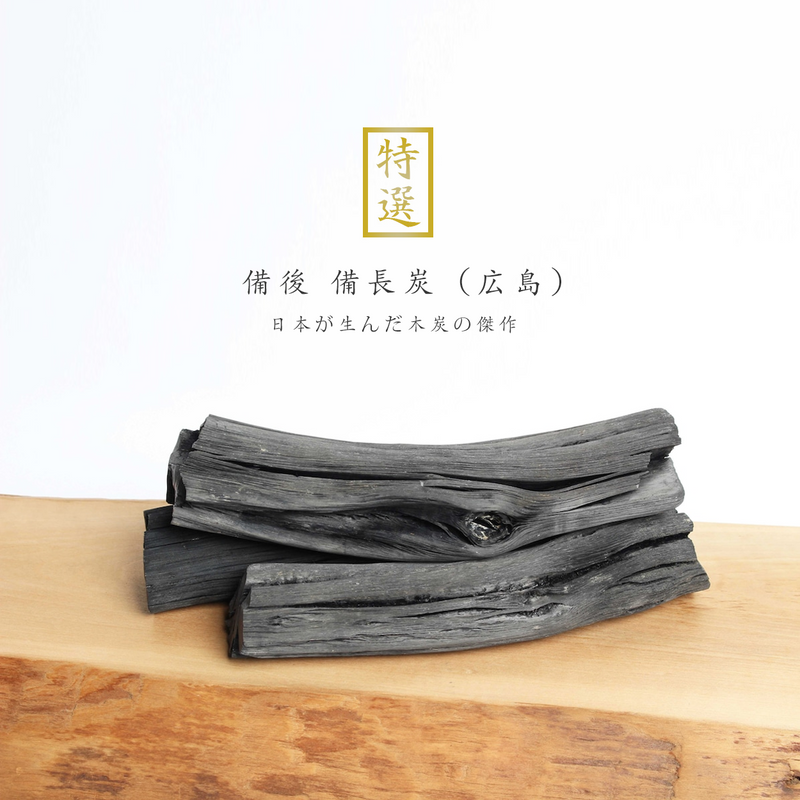 A composite image displaying a close-up of bulk mixed-cut charcoal texture above the branded Premium Hiroshima Bingo Binchotan cardboard box.