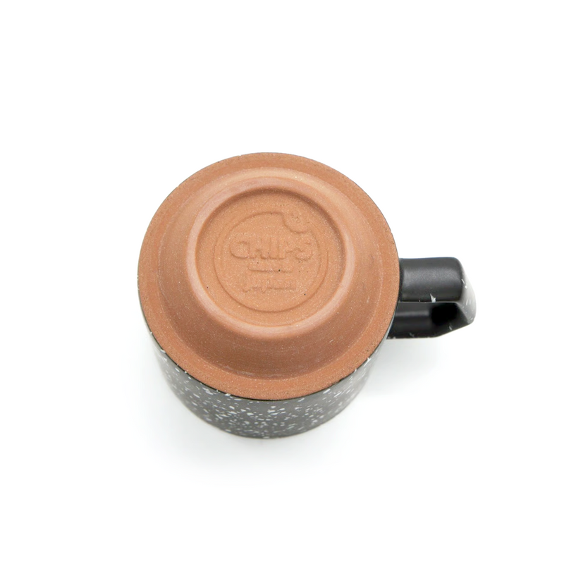 A close-up of the unglazed clay base of the 280ml CHIPS mug, showing the 'CHIPS made in japan' maker's mark.