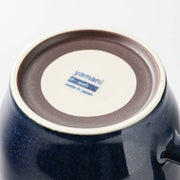 Underside of the Chill Out navy mug showing the maker's stamp