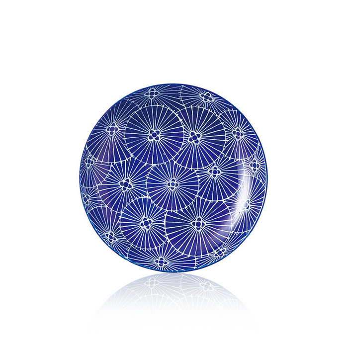 Traditional Japanese plate in deep blue, embellished with multiple white umbrella motifs