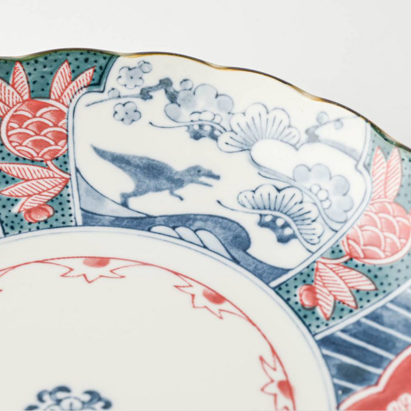 A close-up of the Edokko Dinosaur plate's design, highlighting the playful T-rex illustration hidden within the traditional Japanese patterns.

