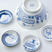 Edokko Dinosaur Seigaiha Japanese Donburi Bowl and four coordinating 9cm mini plates featuring playful blue dinosaur illustrations on white porcelain.