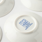 The Awasaka "Made in Japan" maker's mark on the base of an Edokko Dinosaur series plate.

