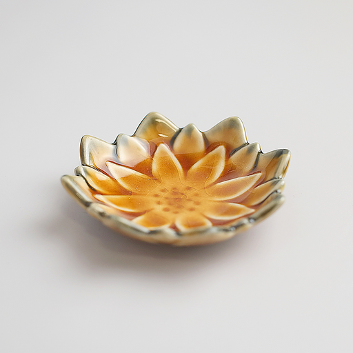 An angled product image of the Fiore Dahlia mini plate in the Autumn Brown colourway, showing its flower shape and crackled glaze.

