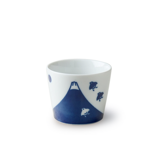 solated view of a white ceramic cup with a stylized blue Mount Fuji and flying birds design, emphasizing its clean, aesthetic appeal.