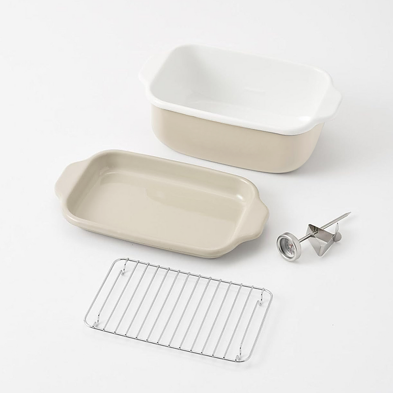 All four components of the Fuji enamel deep fryer set laid out: the deep pot, the shallow tray/lid, the wire draining rack, and the thermometer.