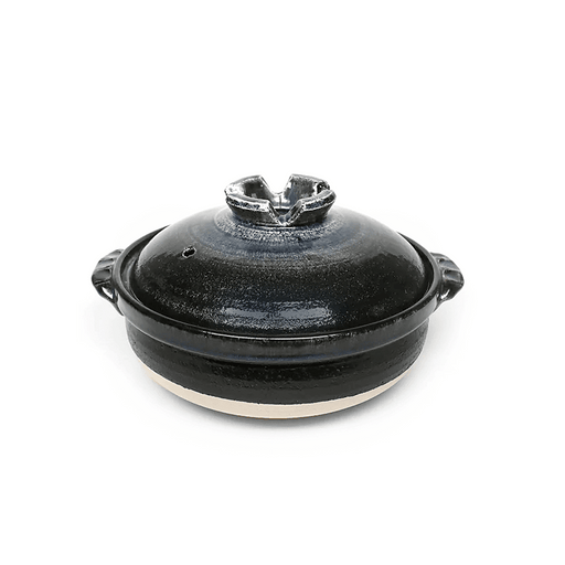 Japanese black-glazed Donabe clay pot with a fitted lid.