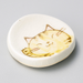 Ceramic chopstick holder featuring a serene yellow cat motif.