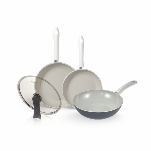 The 4-piece Happycall ceramic nonstick set, showing two light grey Agave frypans, a dark grey BlitZ wok, and a self-standing glass lid.

