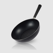 Side angle view of the Happycall Crocodile Direction wok showing its nonstick titanium-coated interior.