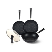 The 4-piece Happycall Crocodile Direction Series cookware set, including a 24cm frypan, 28cm frypan, 28cm wok, and a self-standing lid, shown with modern black handles.







