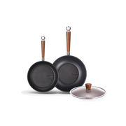 The 3-piece Happycall Crocodile Graphene nonstick induction set, including a 24cm frypan, 28cm wok, and a 28cm glass lid, all with wood-style handles.
