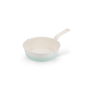 The 22cm Happycall Flex 3-in-1 ceramic nonstick induction saucepan, showing its mint green gradient exterior, ivory interior, and dual pouring spouts.

