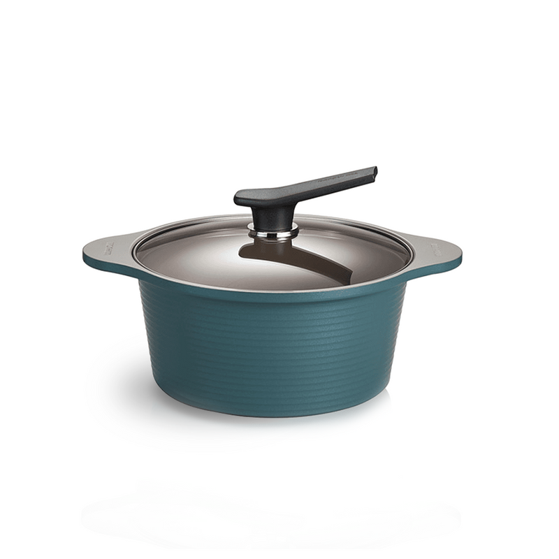 The 24cm Happycall Onde ceramic nonstick induction pot in an ocean green finish, shown with its self-standing tinted glass lid and featuring a ridged exterior.
