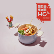 Happycall Meister Edge IH 20cm pot shown in use with seafood soup ingredients and Happy Curator branding.

