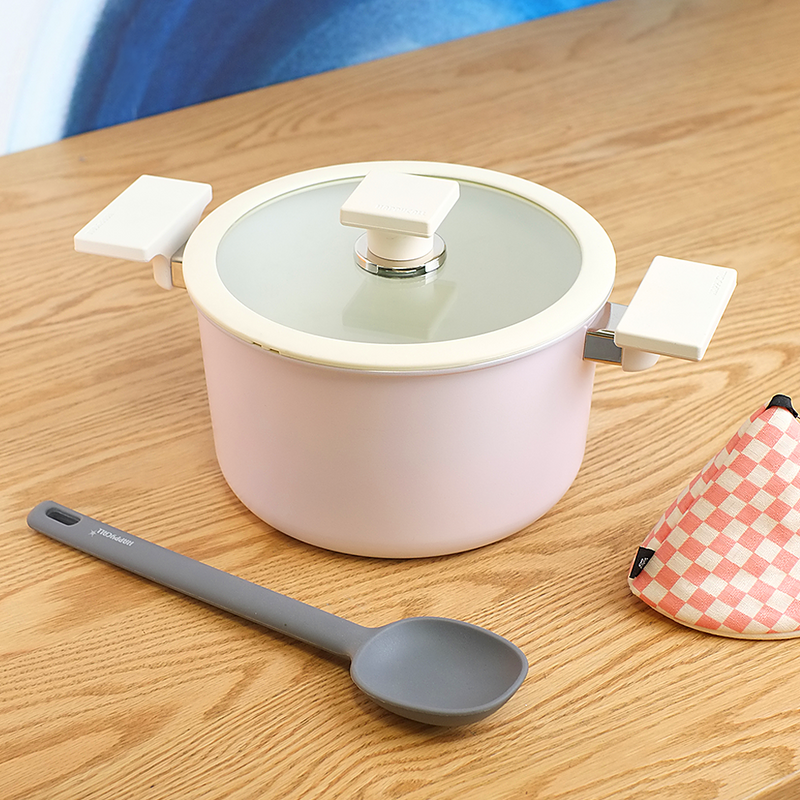 Happycall Meister Edge IH 20cm pot in pastel pink with dual side handles and a glass lid.