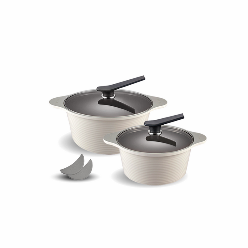 The Happycall Onde ceramic nonstick induction pot set in an ivory finish, showing the 24cm and 28cm deep pots with matching lids, and a pair of silicone pot holders.
