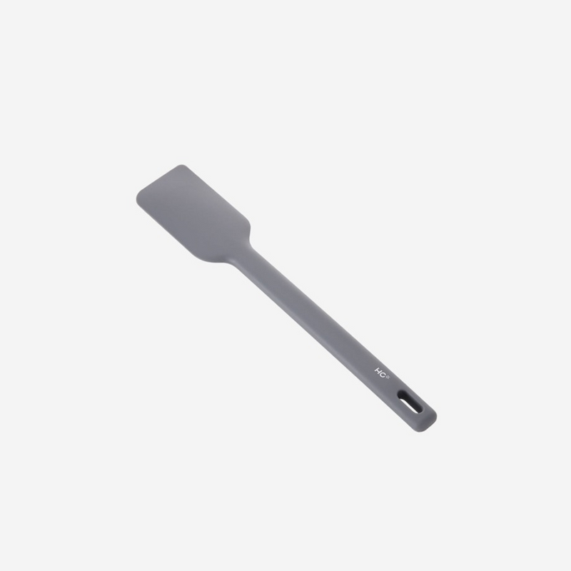 The Happycall VIVA one-piece silicone spatula in dark grey, standing upright against a white background.
