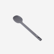 The Happycall VIVA one-piece silicone cooking spoon in dark grey, standing upright against a white background.
