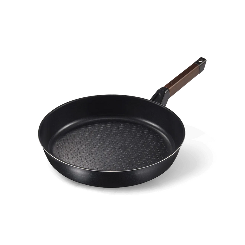 Happycall Royal Graphene Titanium Plus Induction Frypan 28cm with wood-look handle isolated on white background.