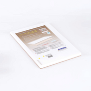 The Hasegawa FBW Series two-tone professional-grade cutting board, shown in its original packaging with product information.
