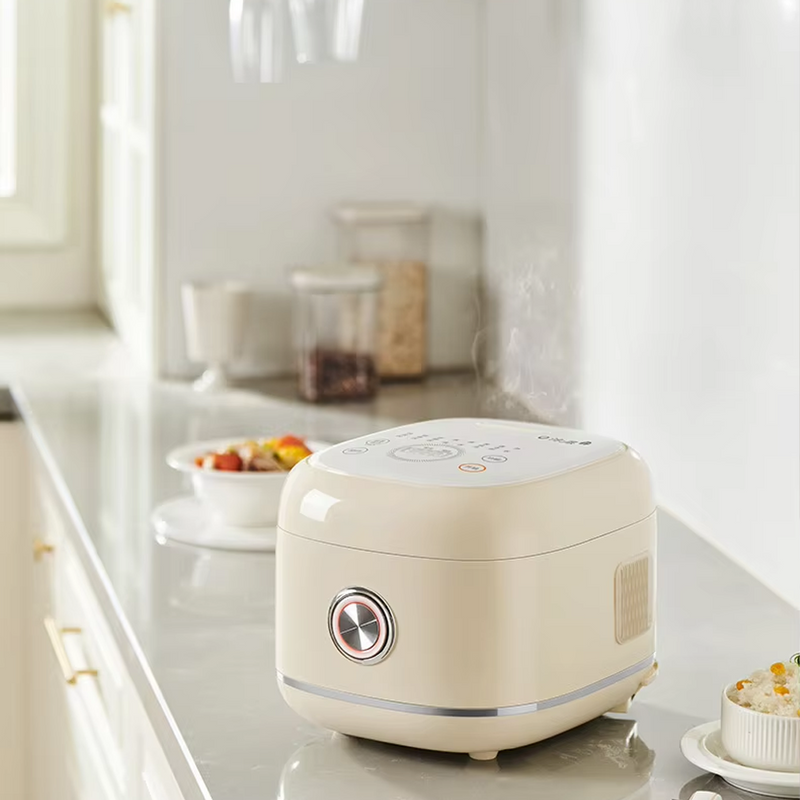 Hoper Layer stainless steel rice cooker operating on a kitchen counter with steam rising, emphasizing its cooking efficiency.
