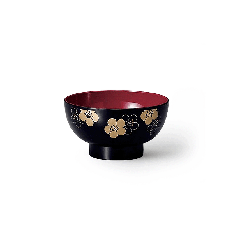 The Ishida Plum Blossom Japanese Soup Bowl, showing its black exterior with gold plum blossom designs and a contrasting vibrant red interior.