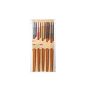 Ishida Weather Delight Chopstick Set featuring five pairs of chopsticks in light blue, pink, yellow, brown, and grey, each uniquely patterned, showcased in a vertically oriented package, Made in Japan.