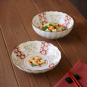A 2-piece Japonica Kikka dinnerware set featuring a large deep plate and a deep serving bowl, both with the traditional red and white chrysanthemum pattern.
