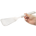 Kai House Select Stainless Steel Batter Beater Spatula with a white handle, displayed against a plain white background. The spatula features a long, slotted metal head suitable for flipping and turning foods.