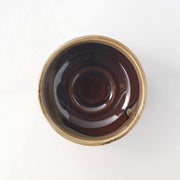 Top view of the Keisai Miyajima matcha bowl's glossy amber-brown interior