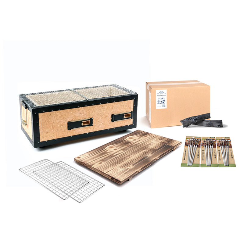 A complete Kinka Okunoto Konro Grill Starter Set, showing the large 54cm diatomite grill on its wooden base, a bag of Tosa Binchotan charcoal, grill meshes, and stainless steel skewers.