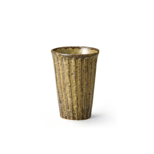 A textured ceramic cup with a mustard yellow glaze and vertical ridges. The cup's surface is speckled with darker spots, adding to its rustic charm. Its tapered shape and visible craftsmanship suggest a blend of traditional and modern influences, ideal for a cozy, artisanal kitchen setting.