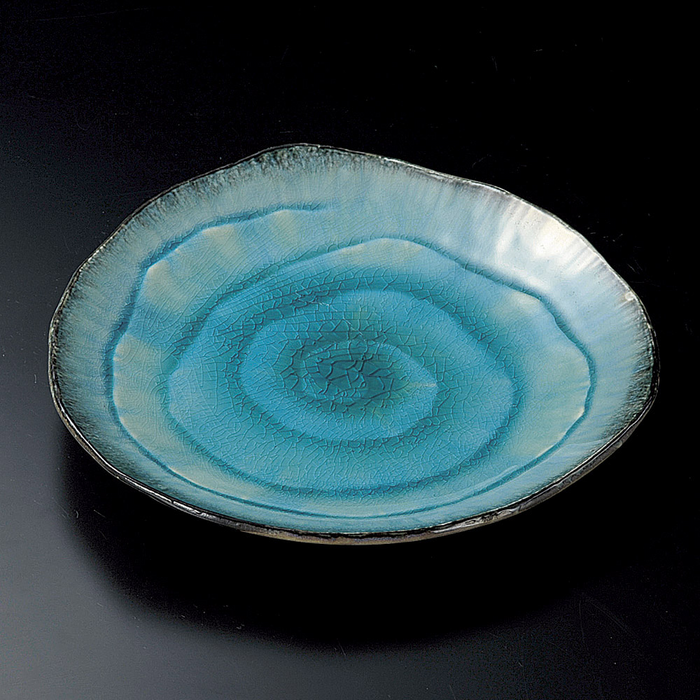 Overhead view of the 24cm Kunkiln Blue Sky plate highlighting its unique shape and vibrant gradient blue tones.