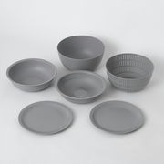 All six grey components of the Like-it nesting bowl and colander set displayed separately on a white background.