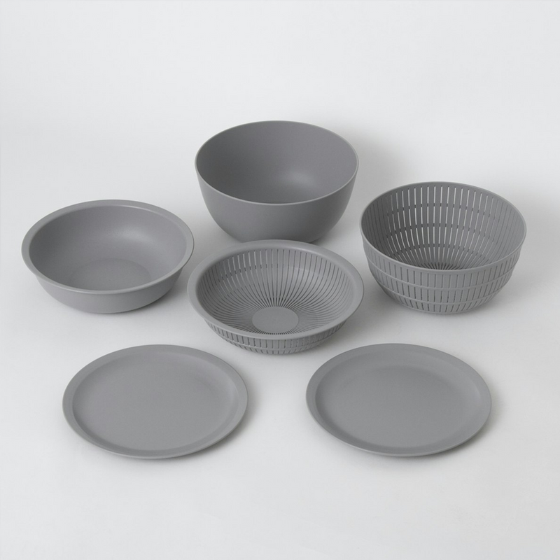 All six grey components of the Like-it nesting bowl and colander set displayed separately on a white background.