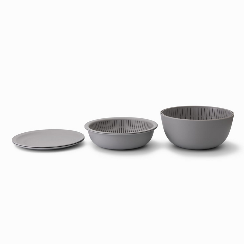 The large bowl, small colander, and one flat plate from the Like-it set arranged in a row to show their relative sizes.