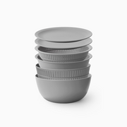 The Like-it 6-piece colander and bowl set shown nested together in a single compact stack for space-saving storage.