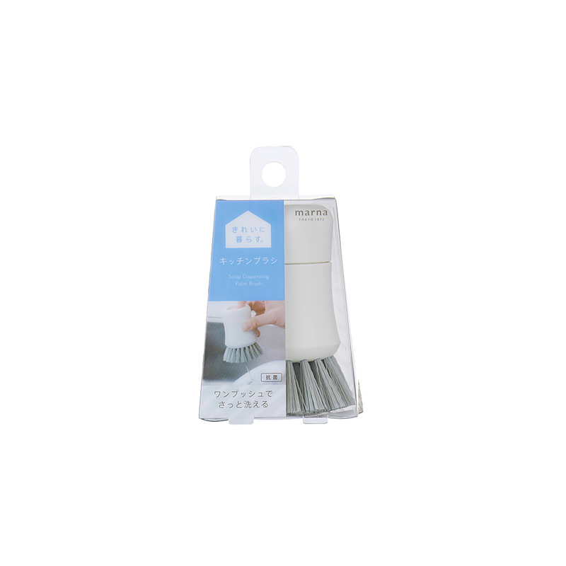 Marna Antibacterial Detergent Dispenser Brush in packaging - A sealed Marna antibacterial soap-dispensing brush in its original Japanese packaging, with a blue and white label.
