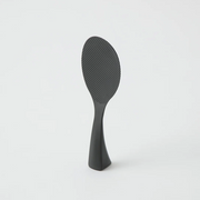 Marna Premium Standing Rice Scoop in black standing upright on its integrated base, highlighting slim profile









