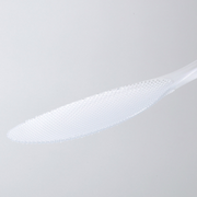 Close-up of the textured non-stick surface of the Marna Premium TPX Standing Rice Scoop.