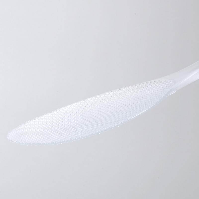 Close-up of the textured non-stick surface of the Marna Premium TPX Standing Rice Scoop.