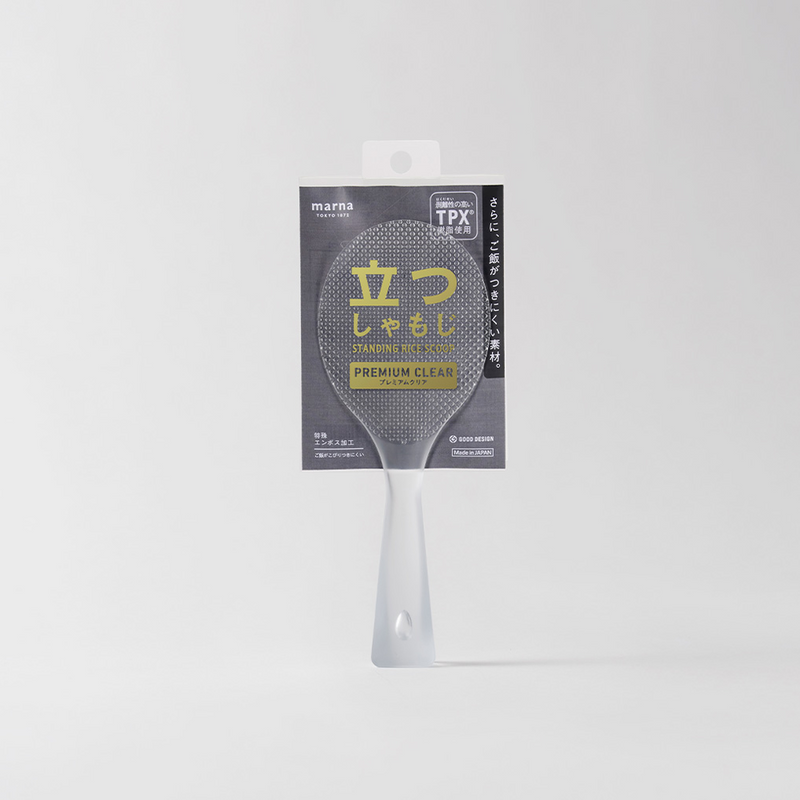The award-winning Marna Premium TPX Standing Rice Scoop, a translucent frosted rice paddle, shown in its official Japanese retail packaging.
