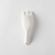 A top-down product shot of the white Marna rice washing tool on a plain background.
